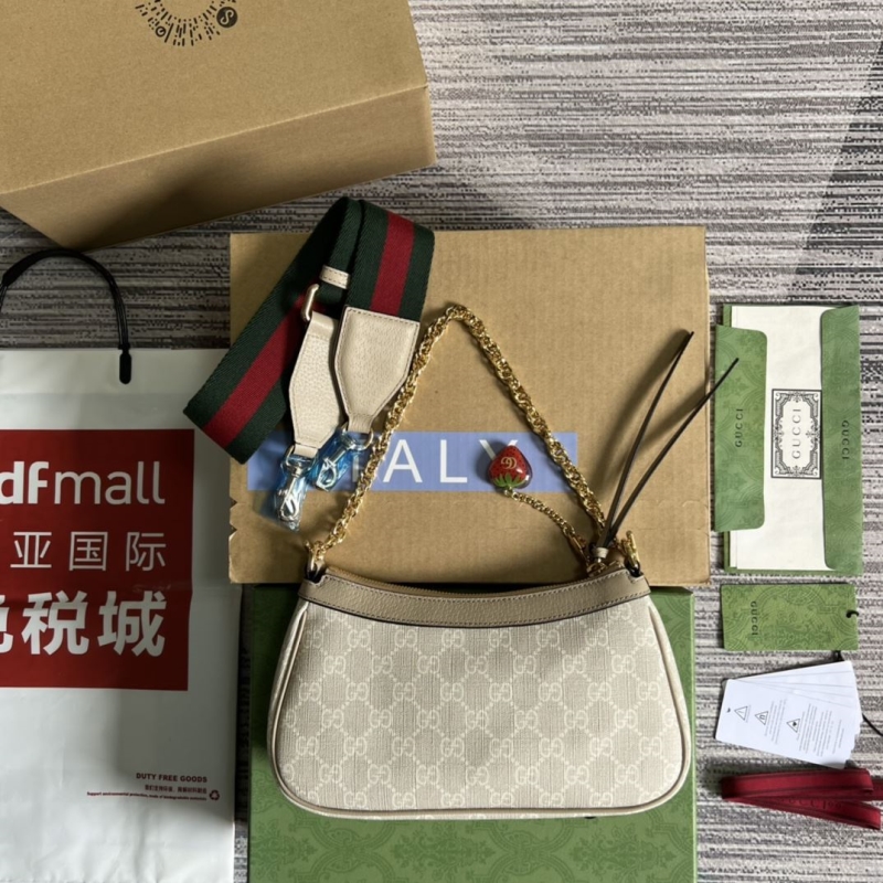 G*u*i top handle bags